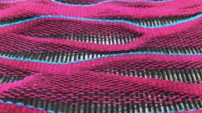 Hot pink weave design resembling waves