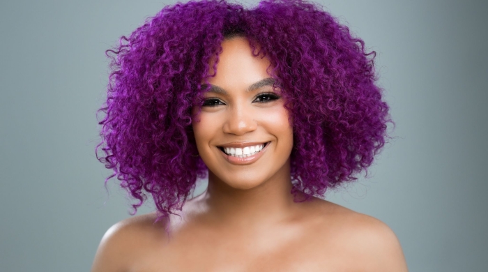 Girl smiling with purple hair