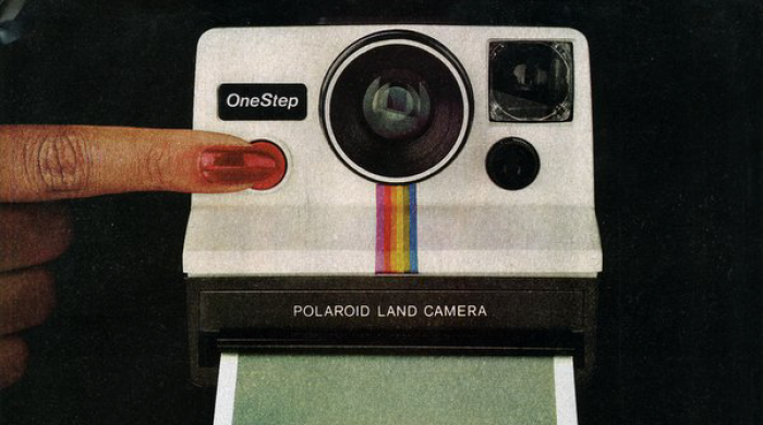 a picture of a vintage polaroid camera