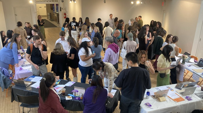 A bird's eye view of the final projects showcase in the Barney Building Commons
