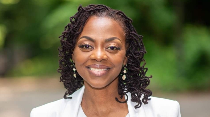 Yolanda Sealy-Ruiz headshot with trees in the background