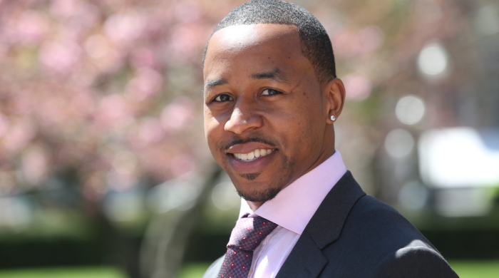 man in suit and tie smiling