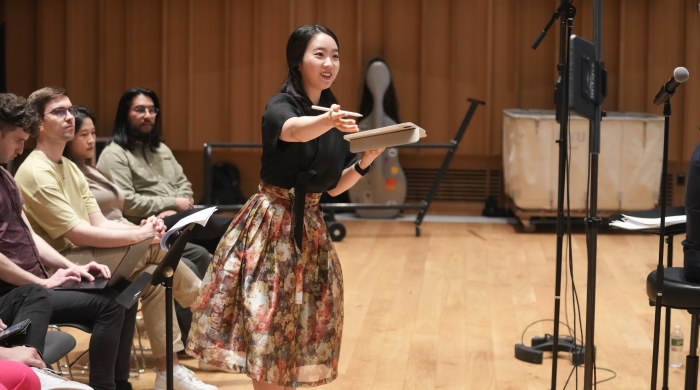 Student conducting orchestra