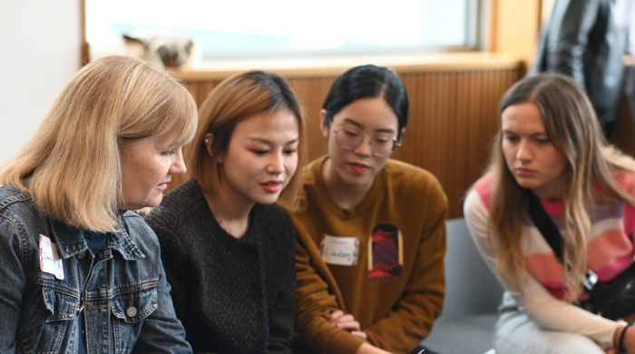 A group of EXPO attendees work together. 