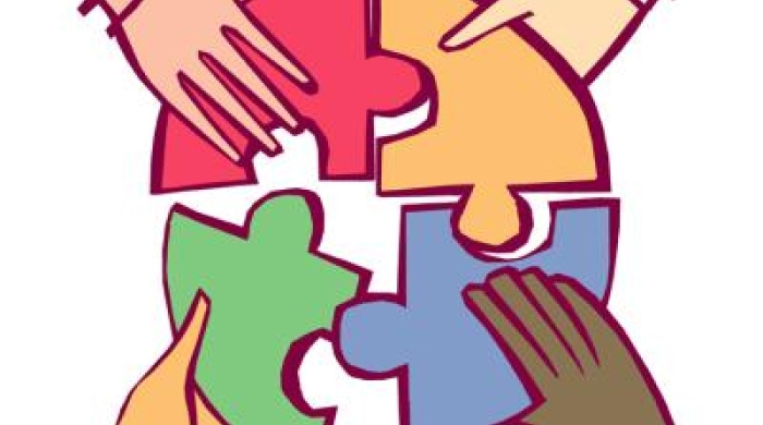 Image of four hands holding puzzle pieces while trying to connect them