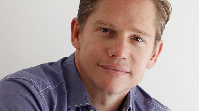 Headshot of Jack Noseworthy on the left and a poster of Broadway Musical “Real Women Have Curves” on the right.