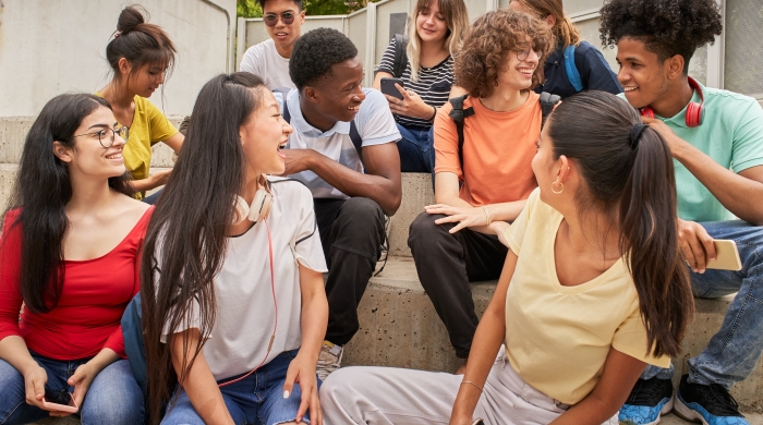 Multi-ethnic group of happy students on a break