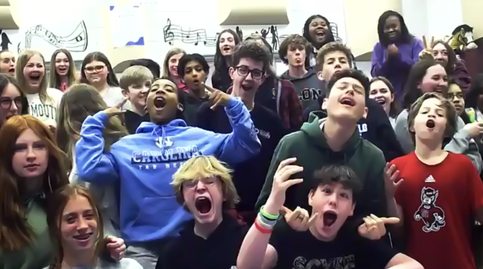 Large group of kids making funny faces and being silly