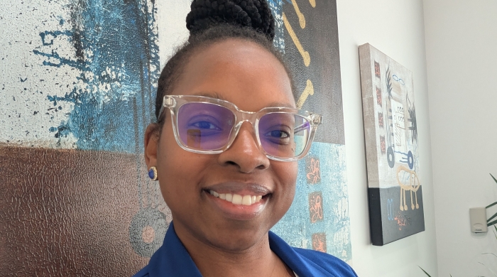 Professional Headshot of Jillian wearing a blue blazer and white shirt.