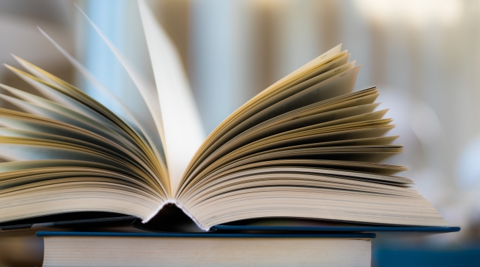 Pages of a book flip open