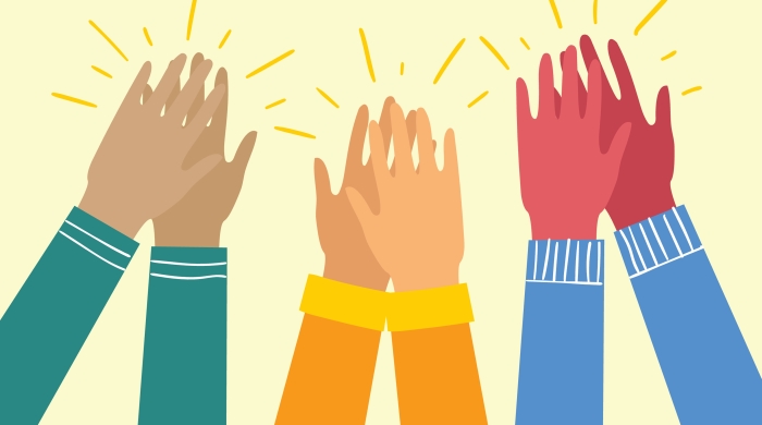 Three pairs of hands give a round of applause. 