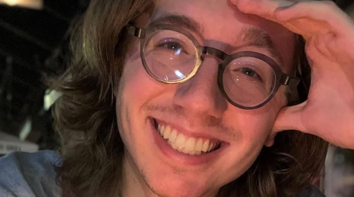 Professional headshot of Parker Hollingsworth