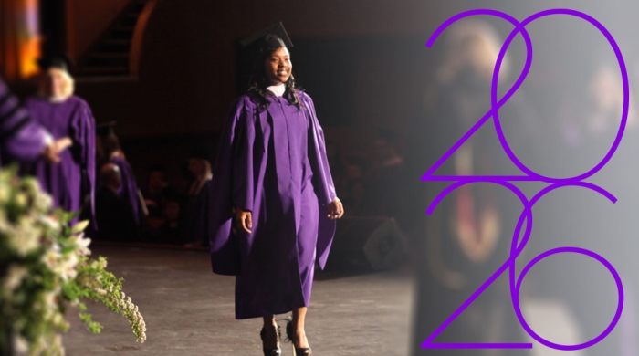 2026 over a student walking across the graduation stage
