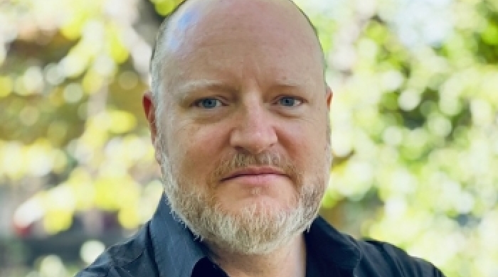 Headshot of Prof Sam Howard Spink