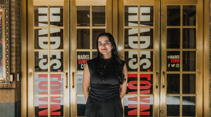 Silviana Abreu stands in front of doors