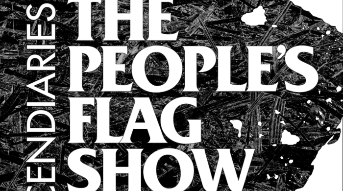 White text on a black and white graphic depicting wood destruction from a fire.
