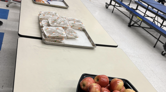 lunch table with apples and other food