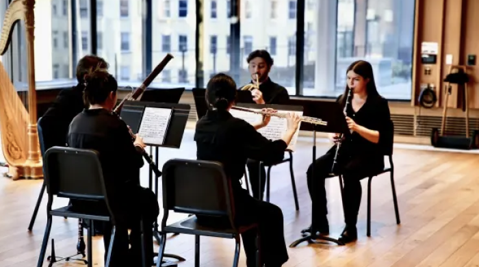 Five Woodwind players performing in paulson center room 620