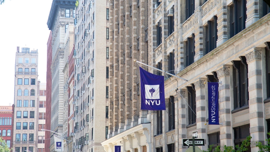NYU flag in front of Pless Hall