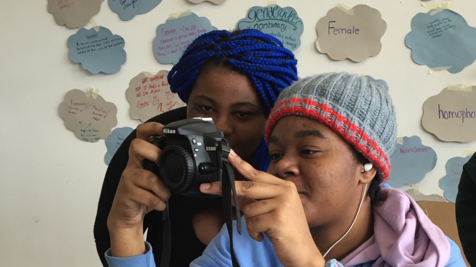 Students in class with camera