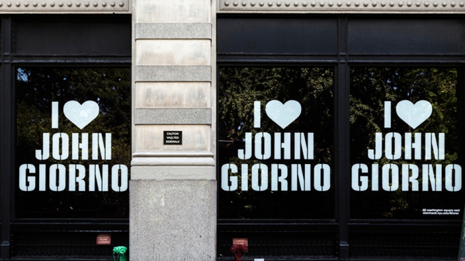 Window display saying I (heart) John Giorno