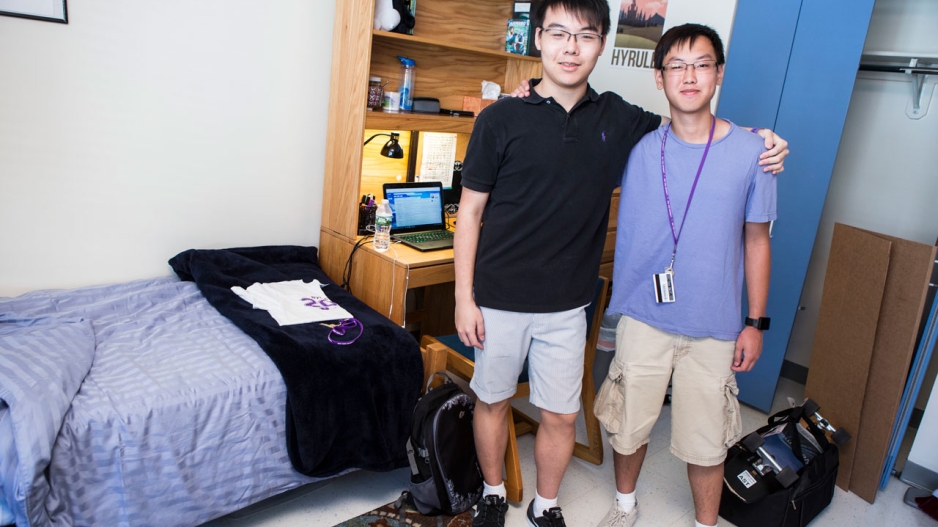 A graduate student RA and an undergrad in his dorm room