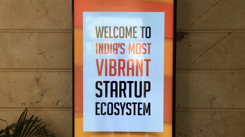 poster on wall that reads "welcome to India's most vibrant startup ecosystem"