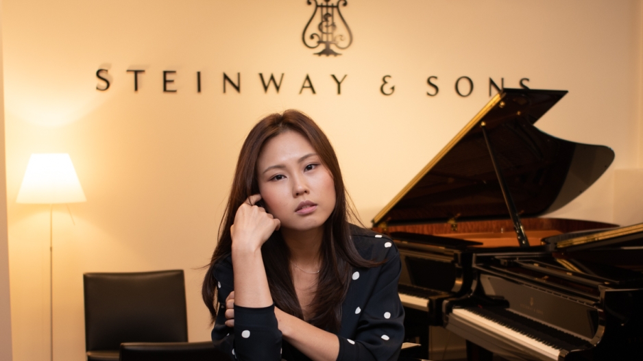 Sunny Choi at a piano with text: Steinway & Sons
