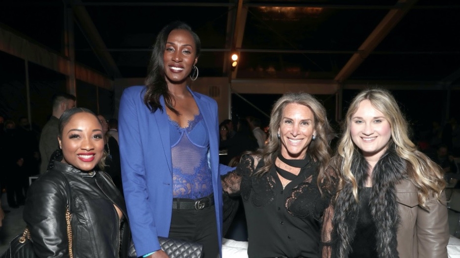 A group shot of four women leaders at the NBC Universal Super Bowl party.