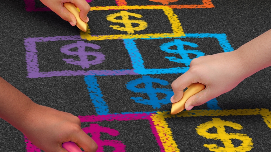 Four children using colored chalk to draw dollar signs along a hop scotch outline