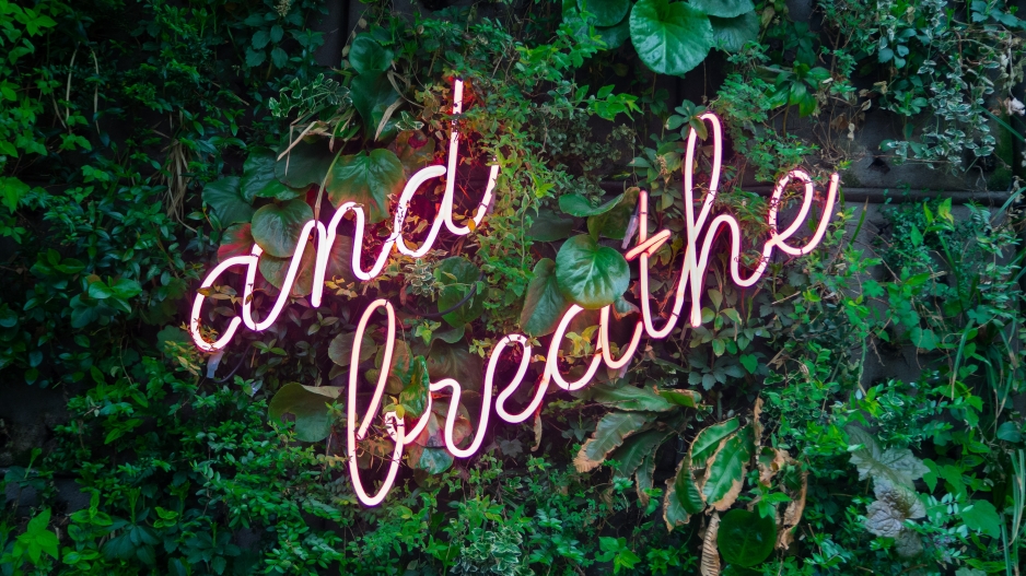 sign saying "and breathe."