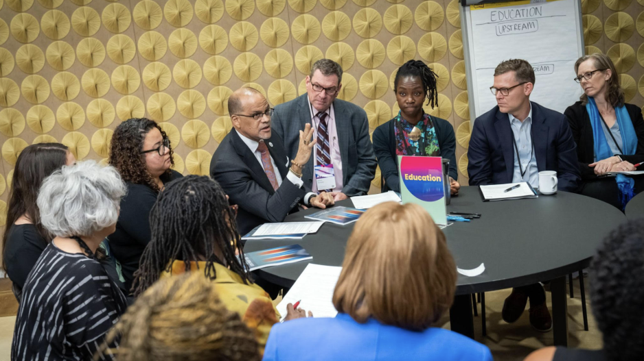 DOE Chancellor David Banks, RANYCS Executive Director James Kemple, and Deputy Director Cheri Fancsali sit at a round table discussion at the 2022 NYC Equity Summit.