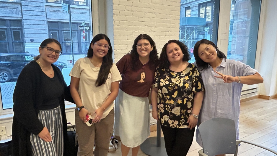 small group of students and teachers posing for a photo