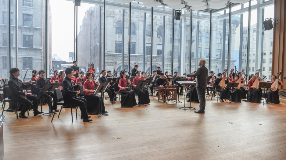 Large group from the central conservatory of music performing in Paulson Center