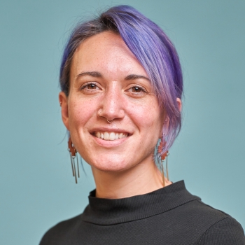 Melody Feo Sverko, a woman with purple hair in a black shirt.