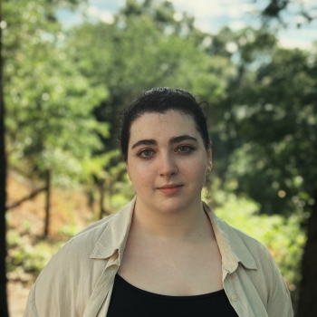 Evelyn Dimov stands for a picture with Riverside Park behind her.
