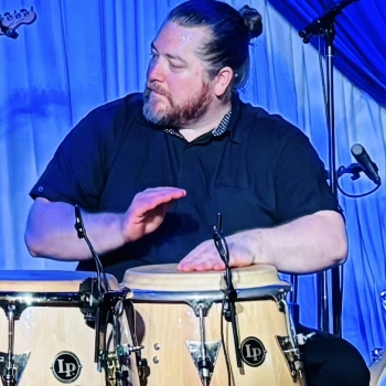 Ian McLeod playing congas
