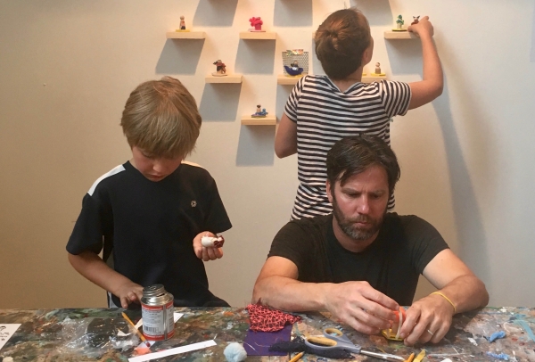 Kids with adult making art