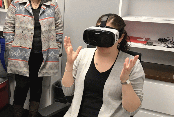 A woman in VR Goggles
