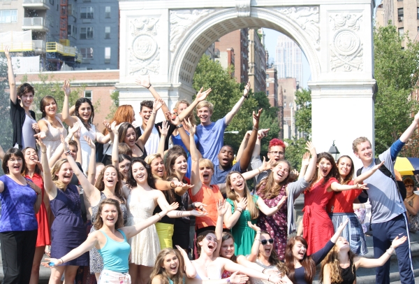 students in front of Washington Square Park arch