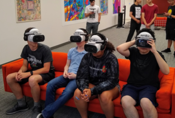 High School Students Wearing VR Goggles