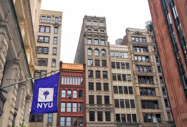 NYU flag on building on Washington Place