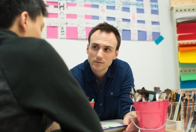 Art therapist working with a teen