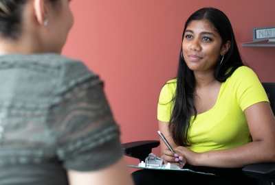 woman talking to client
