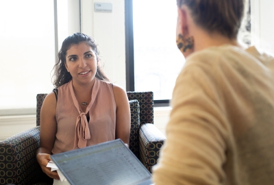 A grad student consulting with a professor