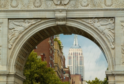 The Washington Square Arch with the empire state building visible between the arch