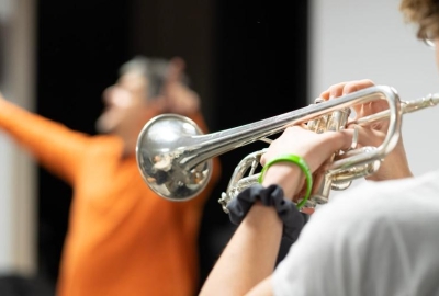 NYU student playing trumpet