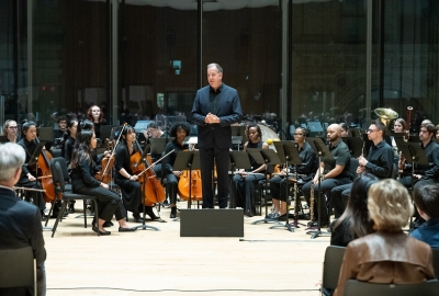 Conductor Ted Sperling with NYU Steinhardt orchestra