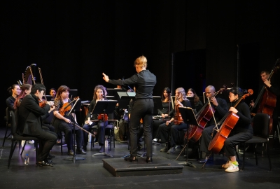 NYU orchestra being conducted by david bloom