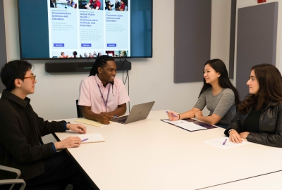Master's students participating in group advising session